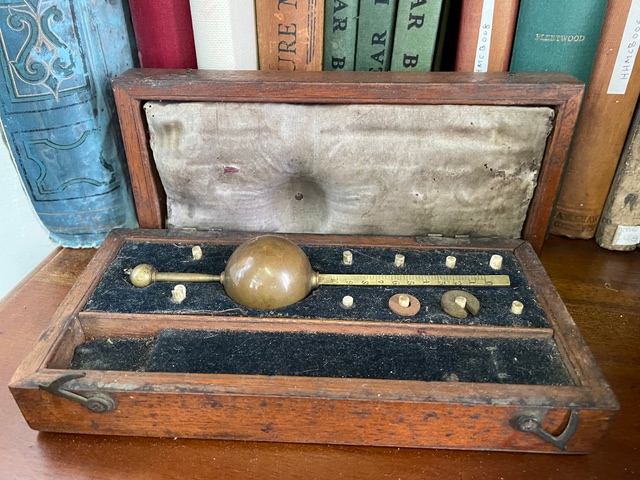 This Sikes Pocket Hydrometre was the property of PJ Mulhall, the owner of Morrissey's Pub. The device was employed by staff to determine the specific gravity, or density, of the spirits it sold.